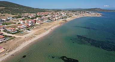 Ayvalık Belediyesi'nden Cunda'daki Arka Deniz Plajı'nda temizlik çalışması