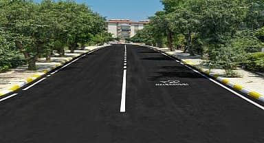 Kuşadası Belediyesi sıcak asfalt çalışmalarına devam ediyor