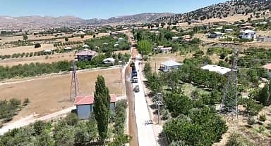 Antalya Büyükşehir'den Korkuteli yayla yollarında asfalt yol çalışması 