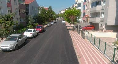 Bozüyük Belediyesi, Bedri Rahmi Caddesi'ni asfaltladı