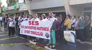 Nöbet ve fazla mesai ücretleri ödenmeyen Ege Üniversitesi Hastanesi emekçilerinden uyarı eylemi: "Emeğimizin karşılığını almadığımız bir çalışma sistemini kabul etmiyoruz"