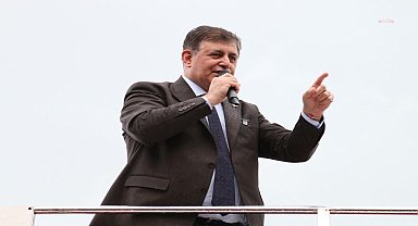 CEMİL TUGAY: 