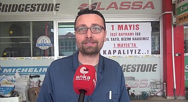 Sinoplu esnaf işletmesinin camına "1 Mayıs işçi bayramı ise asıl tatil bizim hakkımız. 1 Mayıs'ta kapalıyız" yazılı pankart astı
