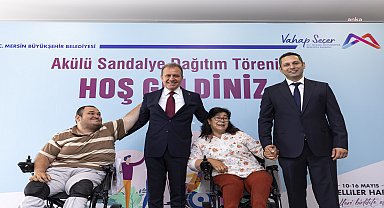 Vahap Seçer, akülü sandalye dağıtım törenine katıldı