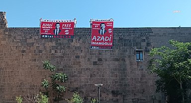 Diyarbakır’da İmamoğlu’nun pankartını surlara asan CHP’liler ‘şüpheli’ sıfatıyla ifadeye çağrıldı