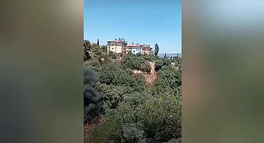 Karacasu'da çöplerin atıldığı makilik alanda yangın